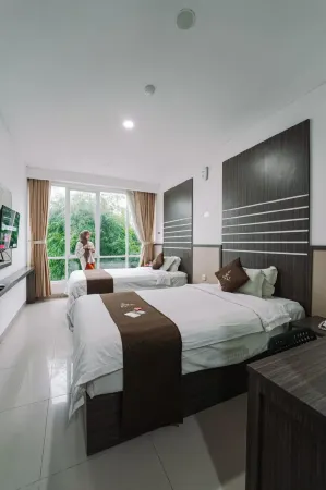 Bell's Place Hotel Отели рядом с достопримечательностью «Таман Будайя Сентул Сити»