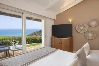 Baia Chia Laguna Resort, Curio Collection by Hilton Hôtels à : Chia