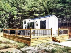 Simple meets modern in this farmhouse style tiny home!