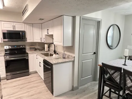 1st Floor Completely Remodeled, Pets Welcome!!! King & Queen Beds, W/D in Unit.,