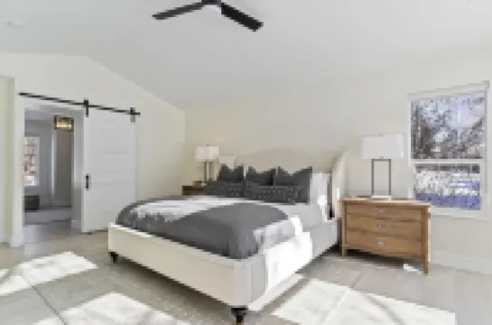 Stunning Lakefront Retreat with Jacuzzi and Unobstructed Mountain Views