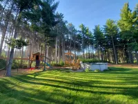 4 Bedroom lodge on wooded land with heated swimming pool and hot tub