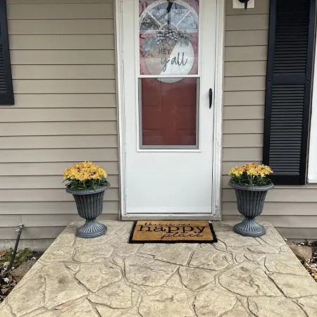 Near Kansas City Area Cottage with a Fire Pit! Comfy Beds and a Stocked Kitchen.
