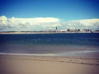 Comfortable holiday center house with its own garden directly at the nature reserve Hotels in Borkum