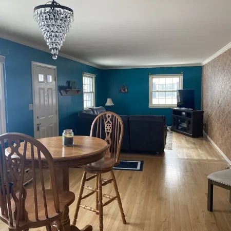 3 bedroom/2 bath home; close to EAA. Large kitchen and outside deck area.