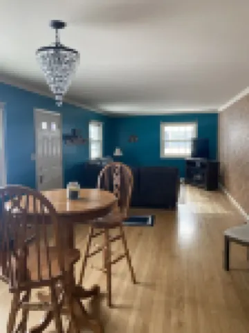 3 bedroom/2 bath home; close to EAA. Large kitchen and outside deck area.