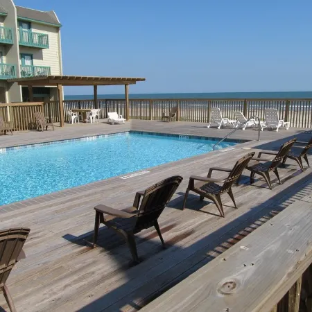 Beachfront Two Bedroom Condo with a Pool/2 nights or 7 nights. Pet friendly!