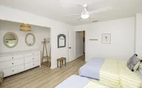 Pet friendly beach house w/private backyard & outdoor shower- steps from beach