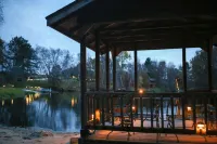 Lakeside cabin with Hot Tub and full kitchen!  Sleeps up to 12 people.