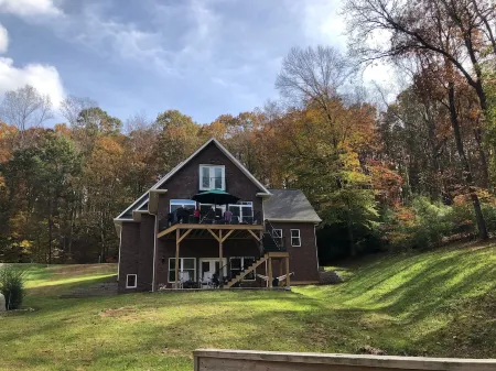 Lakefront Custom Home /w Private Dock on Cove.  Finished Basement.  2 Kitchens