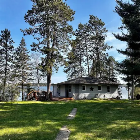 Relax in a cozy and private lake front cabin with breathtaking views!