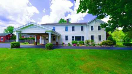 Spacious Colonial Farmhouse on 240 Acres