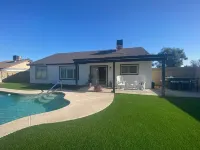 4 BR, 2 BA home with heated pool located near shopping, dining & entertainment