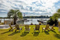 Coastal townhome with outdoor living, central AC, washer/dryer, & pool access