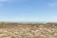 Oceanfront Deck and Community Pool - Inviting Coastal Sanctuary