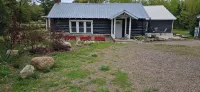 THE 1852  LOG HOUSE.