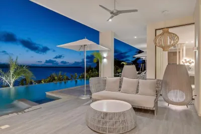 Gorgeous Beach House Perched Right Over the Ocean Hotels in 