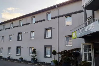 Cottage Logis Hôtel - Restaurant Hotels near Documentation Center on Migration (CDMH)