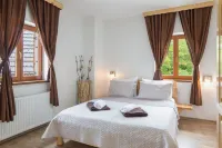 Rustic Lodge Plitvice Hoteles en Prijeboj