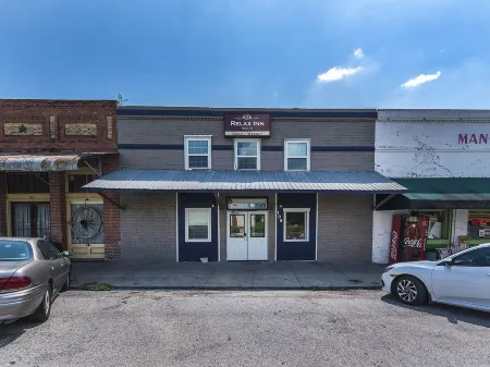 Relax Inn Отели в г. Манор