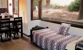 Altos Medanos Cabañas & Club de Bosque