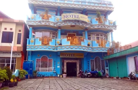 Trivadoh Syariah Hotel Отели в г. Lima Kaum