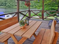 Holiday Home by Lake Rosnowskie with Boat
