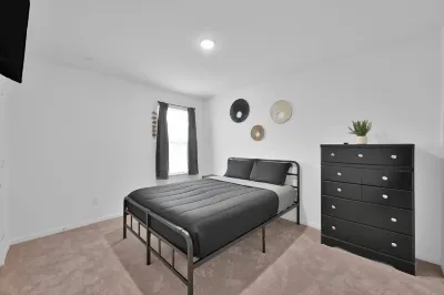 Modern Central 5 Bdrm Home W/ Fenced Backyard Hotels near Mims Baptist Church