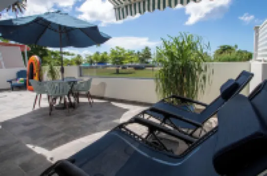 Beachfront in gated community with patio,  balcony, pool, close to all in Rincón