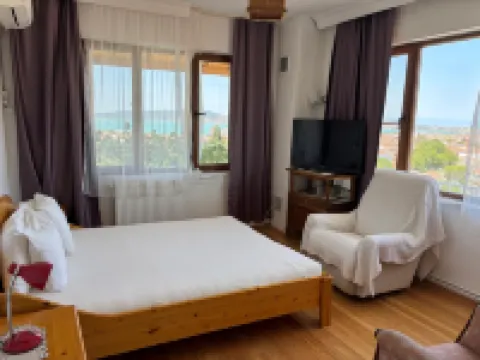 กูเนบากัน ทาเลียนี โอเตล โรงแรมใน