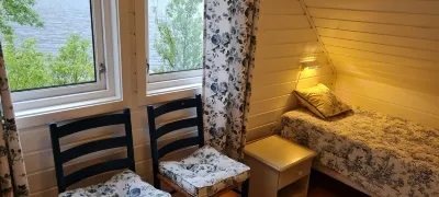 Øydvinstod Hyttegrend located by the untouched Osafjord.A lovely Romantic place. Hotels near Olav H. Hauge Center