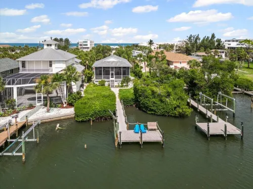 Private Bayfront Beach House w/ Dock & Spa, Steps to Beach and Restaurants