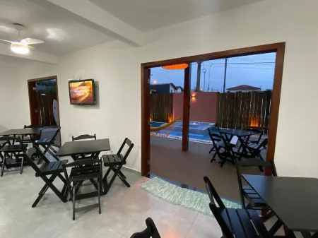 Lalabella Praia Grande Отели рядом с достопримечательностью «Ubatuba Bus Station»