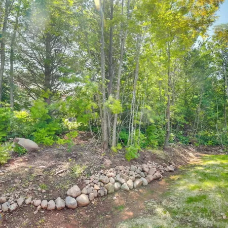 Wooded Hancock Home Near Ski and Snowmobile Trails!