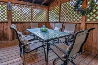 New Song Appalachian Chink Style Cabin Features Foosball and Air Hockey Table by RedAwning