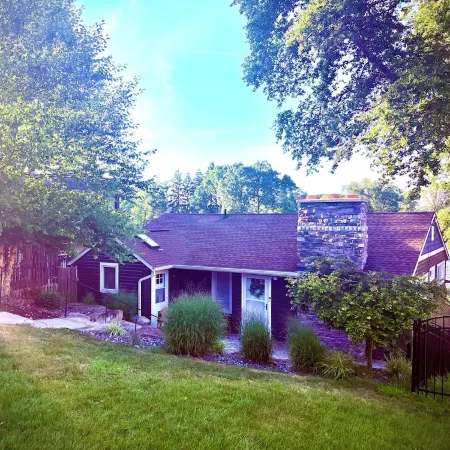 HEAVENLY Portage Lakes water front 4-bedroom cottage with HOTTUB, dog friendly!