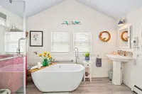 Lakeview retreat with beach access. Stylish home just steps from Deep Run Beach.
