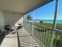 Family-friendly beachfront condo with pool and private lanai
