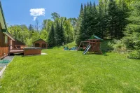 Cozy 3-bedroom cabin in charming Haverhill with Hot Tub, Play Area & Fire Pit