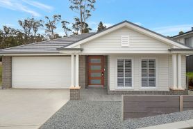 4 bedroom Hampton style home with theatre room. Close to CBD and beaches