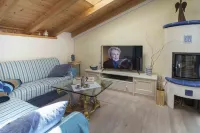 Penthouse with lake and mountain views in Molveno Hotels in Molveno