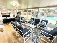 Private 4-bed/3 bath house with putt-putt golf, heated pool, and hot tub.