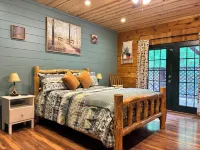 Fall Foliage Riverfront Cabin w/Hot Tub, King Bed, EV & Firepit & Mountain Views