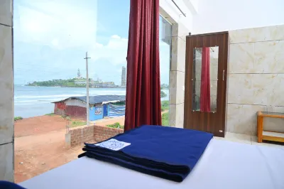 Blue Pearl Beach Guest House Отели рядом с достопримечательностью «Shri Murdeshwara Beach»