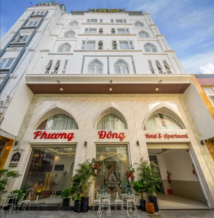 Phuong Dong Hotel and Apartment Отели в г. Куинён