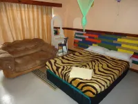 Flintstones Backpackers Hotels near Namo Computers | Computer Shop