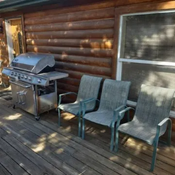 Location! Nice log home in dark sky community next to several peaks