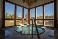 Resort home with Private hot tub , fireplace, pools, pond, WIFI