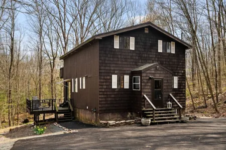 Poconos Retreat with Hot Tub, Fire Pit & Game Room