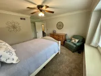 BACKYARD OASIS! Cozy and charming 60s Brick ranch with relaxing gazebo over pond